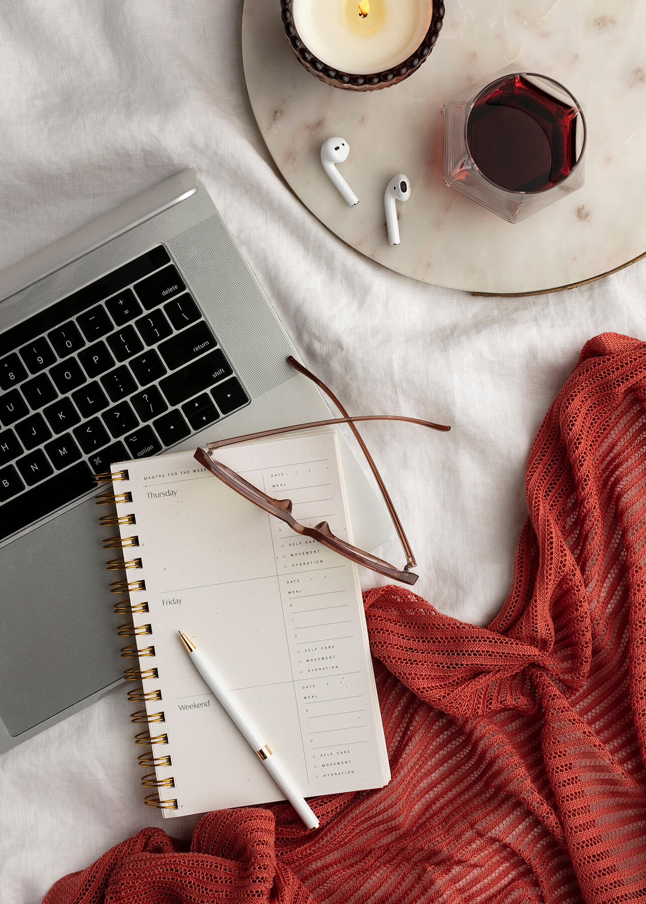 A quiet workspace with candle, tea, and a journal — because no single breathing technique for stress works for everyone.